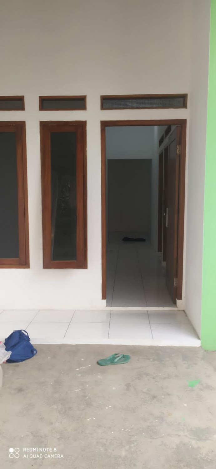 pintu dpan rmh siap huni di villa gading harapan.jpeg