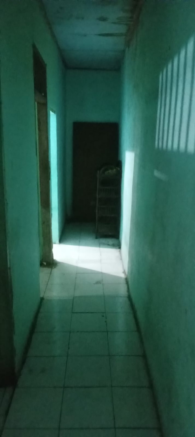ruang belakang rmg second di pondok kelapa.jpeg